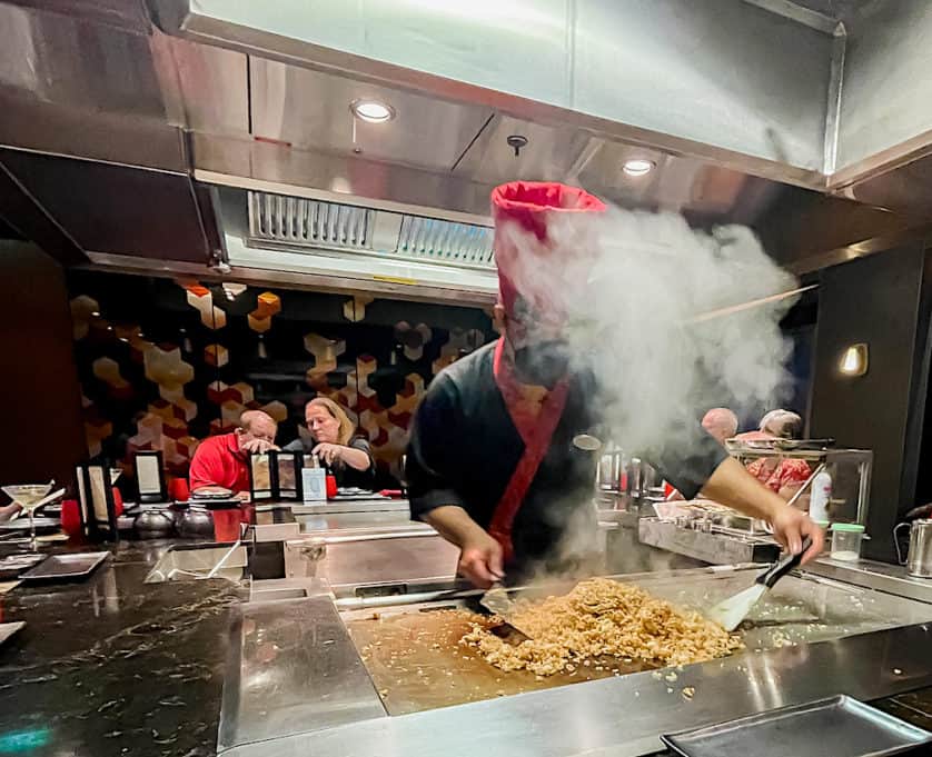 Teppanyaki chef cooking aboard Norwegian Bliss.