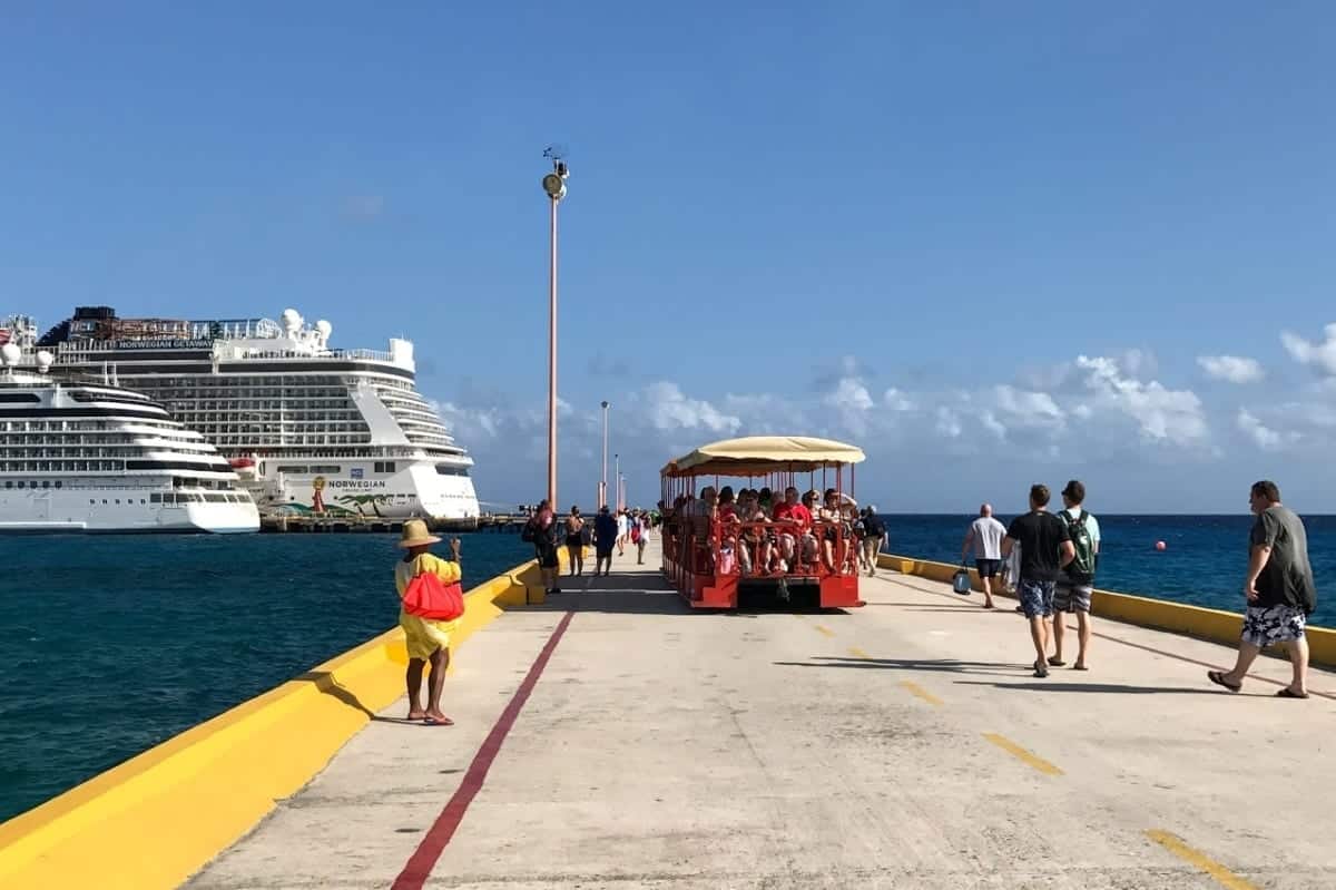 People on board the free trolley at the port back to the ship.