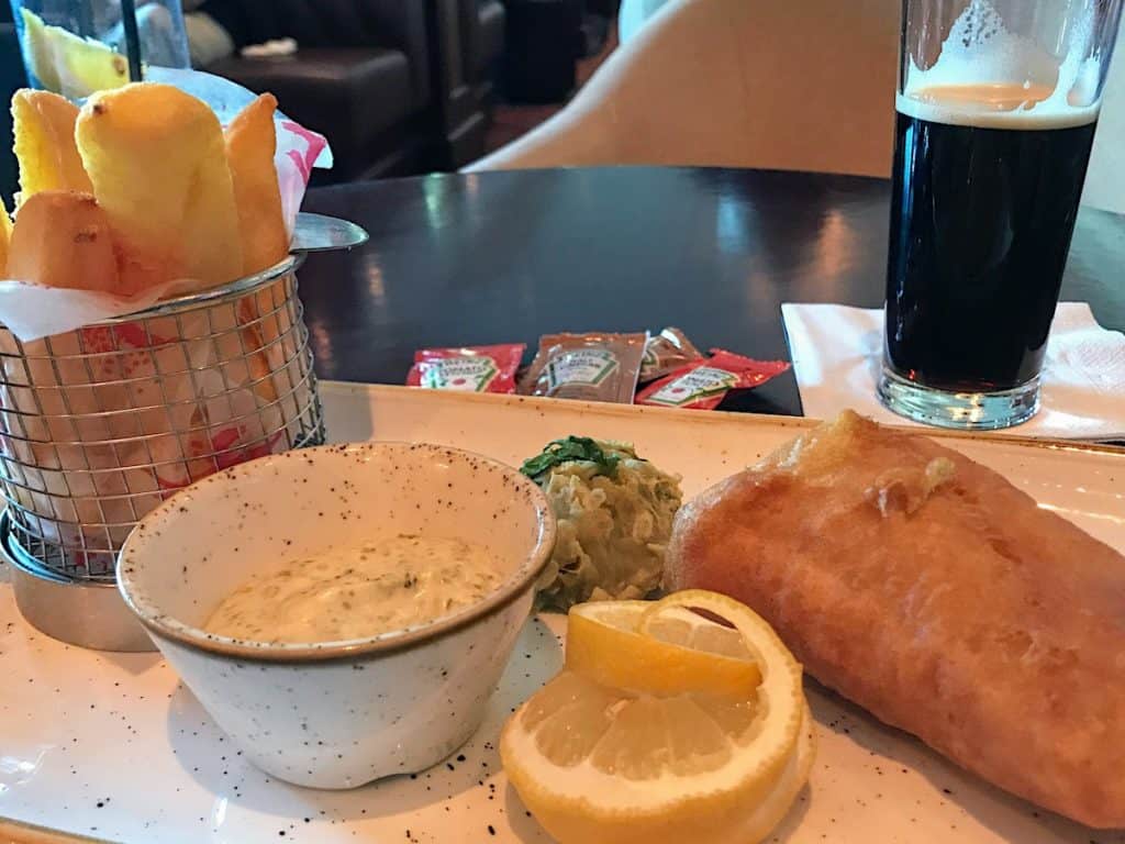 Golden Lion Pub Fish and Chips lunch and a glass of Guiness.