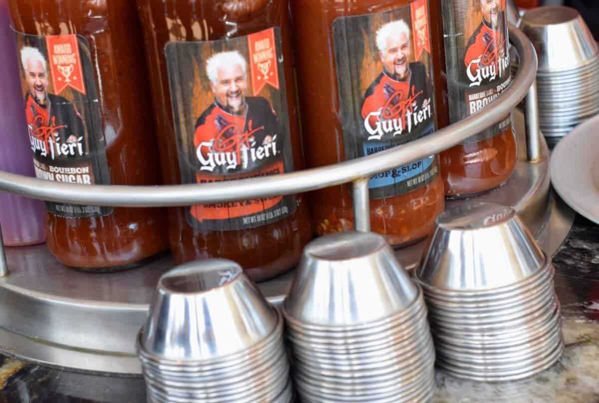 A selection of Guy Fieri's sauces for your BBQ.