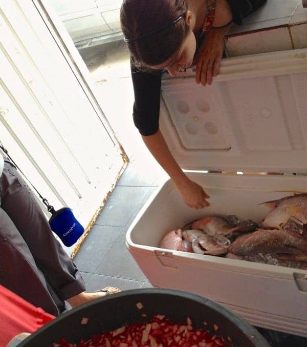 Emily choose a couple of fresh fish from the cooler, for our lunch.