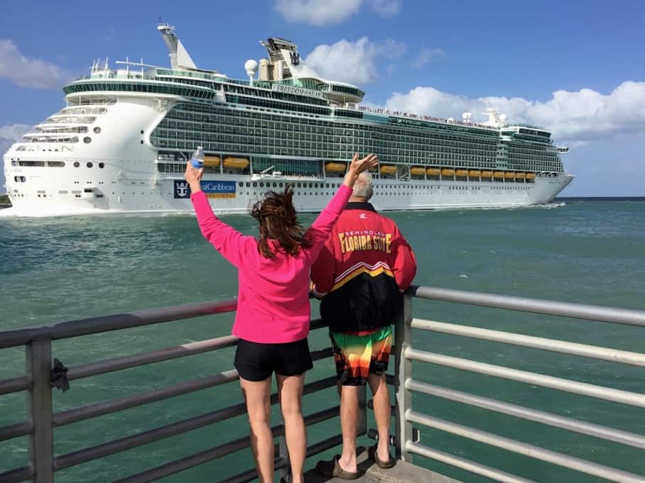 People at Jetty Park Port Canaveral watching Royal Caribbean ship depart.