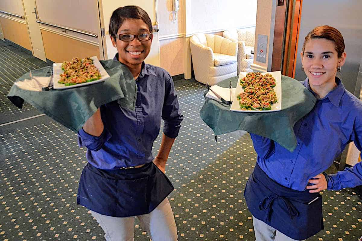 Queen of the Mississippi waitstaff with appetizer trays