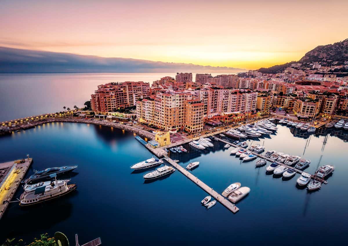 Aerial view of a yacht harbor at sunset in Europe.