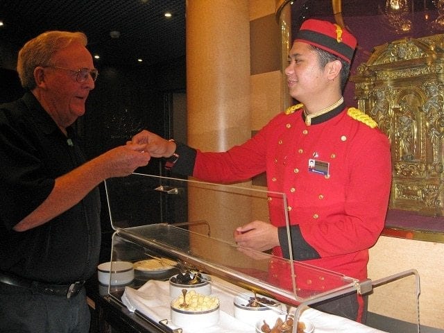 Serving after-dinner mints onboard the Oosterdam