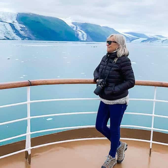 Sherry on Alaska cruise with glaciers in the background