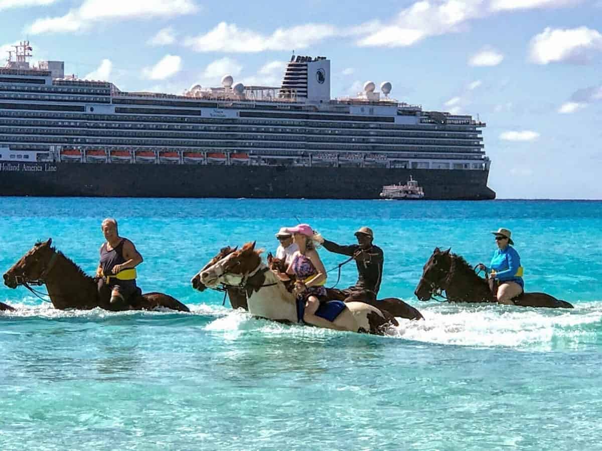 Half Moon Cay Sherry Laskin on horseback in the ocean