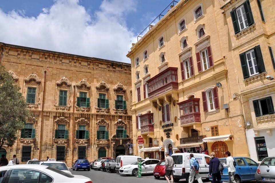 People walking through the open city square in downtown Old Town.