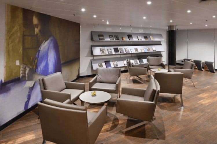 Lounge seating in a sitting area onboard Holland America Westerdam