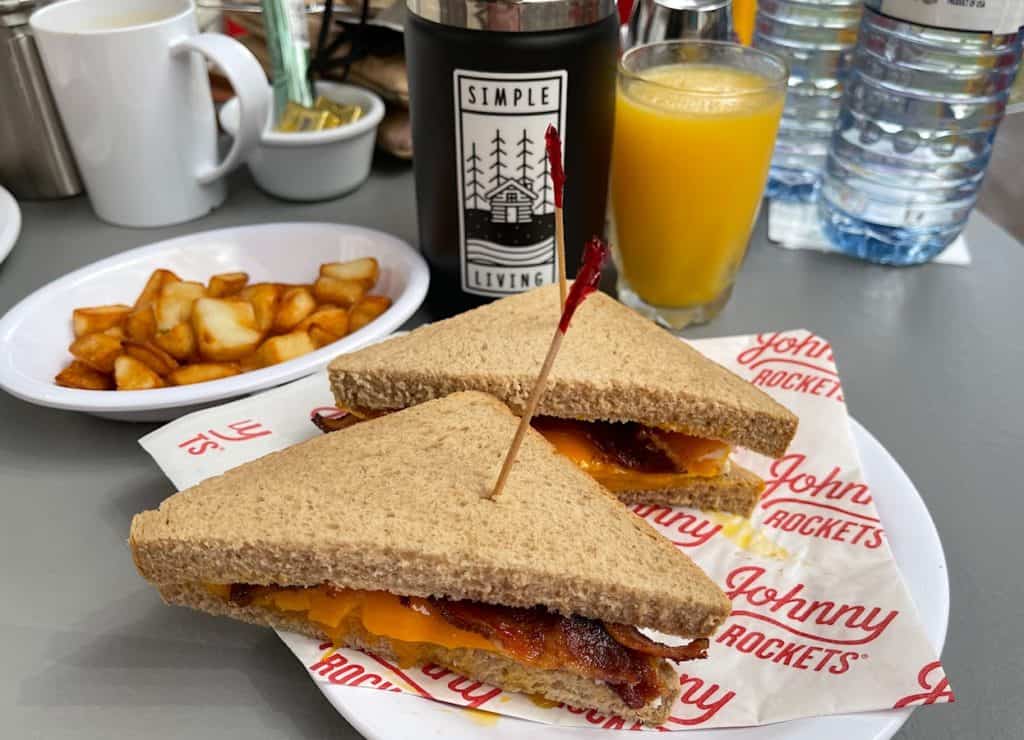 Complimentary breakfast of bacon, egg and cheese sandwich at Johnny Rockets